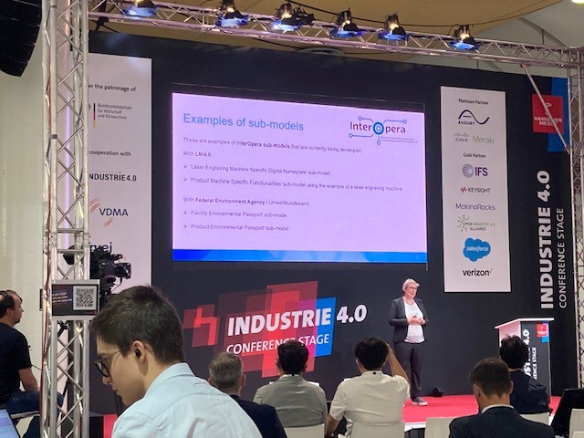 InterOpera_I40's tweet photo. Heute auf der @hannover_messe: Unsere #InterOpera Projektkollegen Alexandra Fezer/@SEZ_Europa zu Teilmodellen der #AssetAdministrationShell & Jens Gayko/@sci_40 zum #DigitalerProdukpass auf der #Industrie40 Bühne der #HM22 - bei Fragen sind wir in Halle 8 an Stand D24💡 #AAS #DPP https://t.co/0wIRDBUFyk