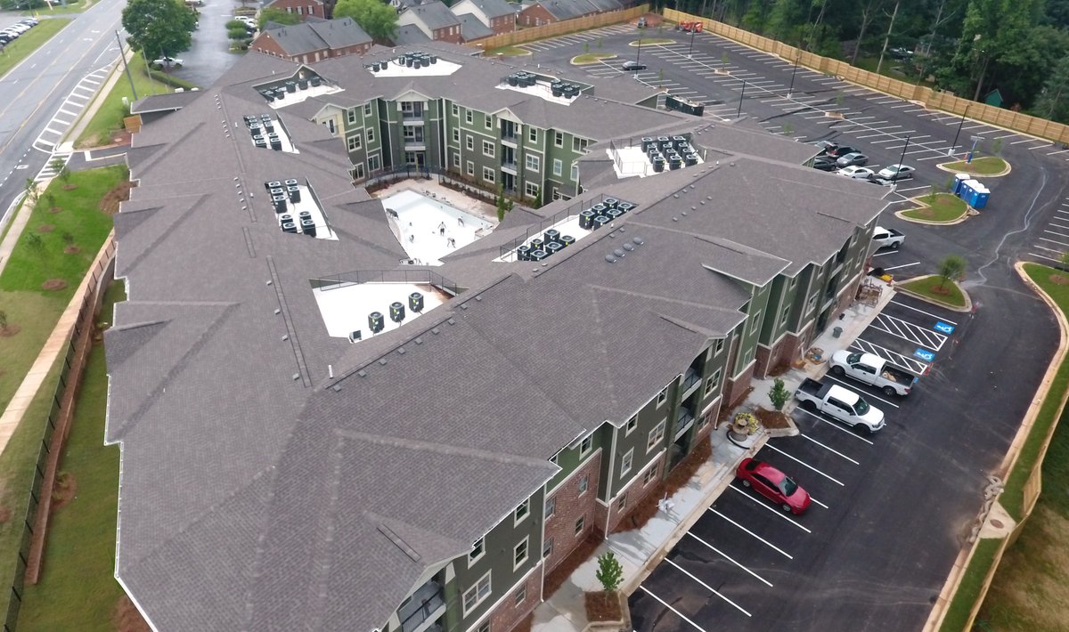 Van_WinkleCo's tweet photo. Excited for move-in day soon? Shiloh Road Apartments near @kennesawstate in @cityofkennesaw looks lusher by the minute as landscaping takes root and the pool is in a just-add-water state! #construction #constructionmanagement #multifamily #apartments #pool #studenthousing https://t.co/QLpXefIRUi