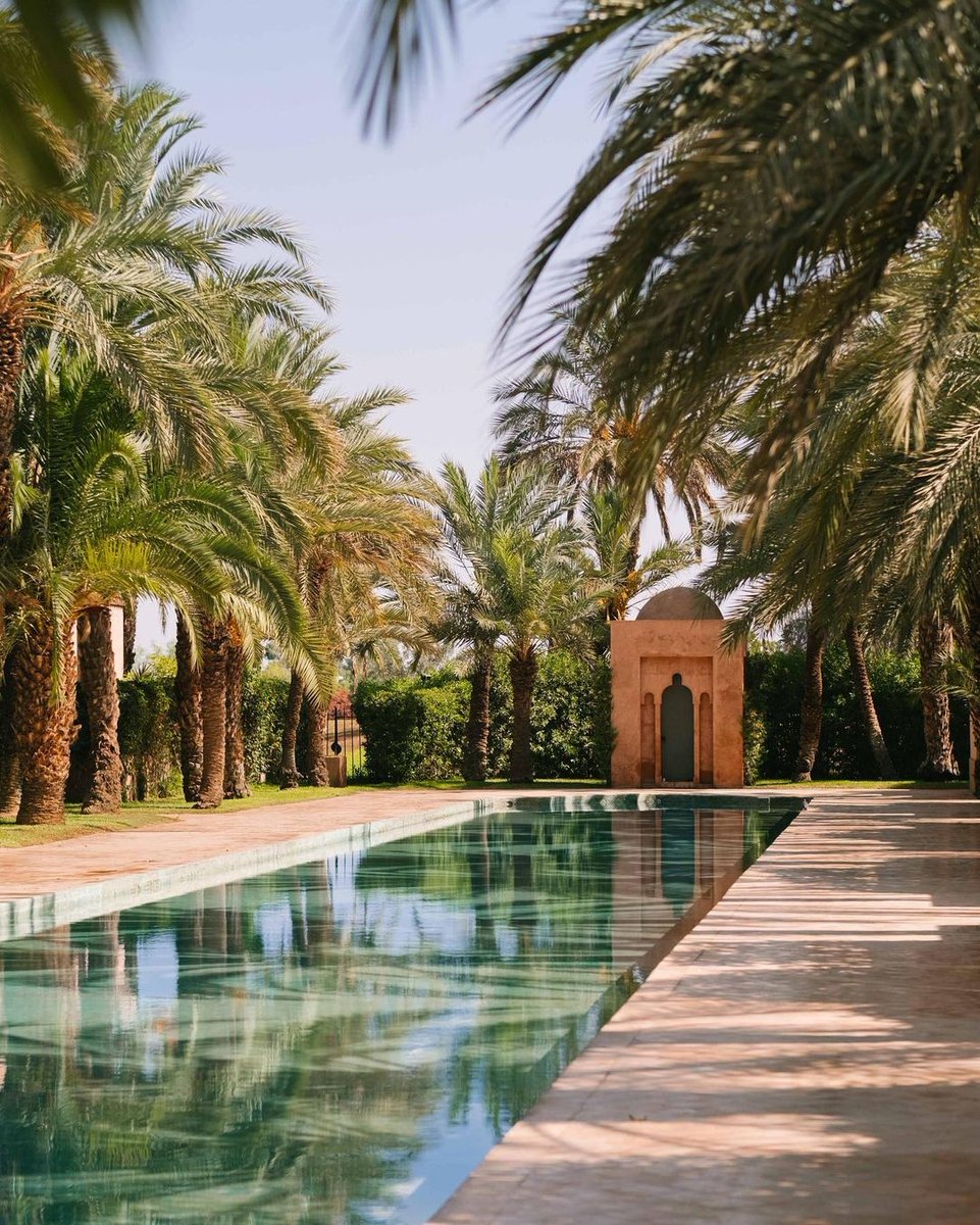 Amanresorts's tweet photo. The pink walls and Moorish arches of #Amanjena conjure the essence of ancient Marrakech. Nourished by a central bassin and with the pattering of fountains ever-present, palms stand in regal sentry throughout the gardens.

Photography by Via Tolila

https://t.co/C8ssTLpPzU https://t.co/1YQ3CCE8F7