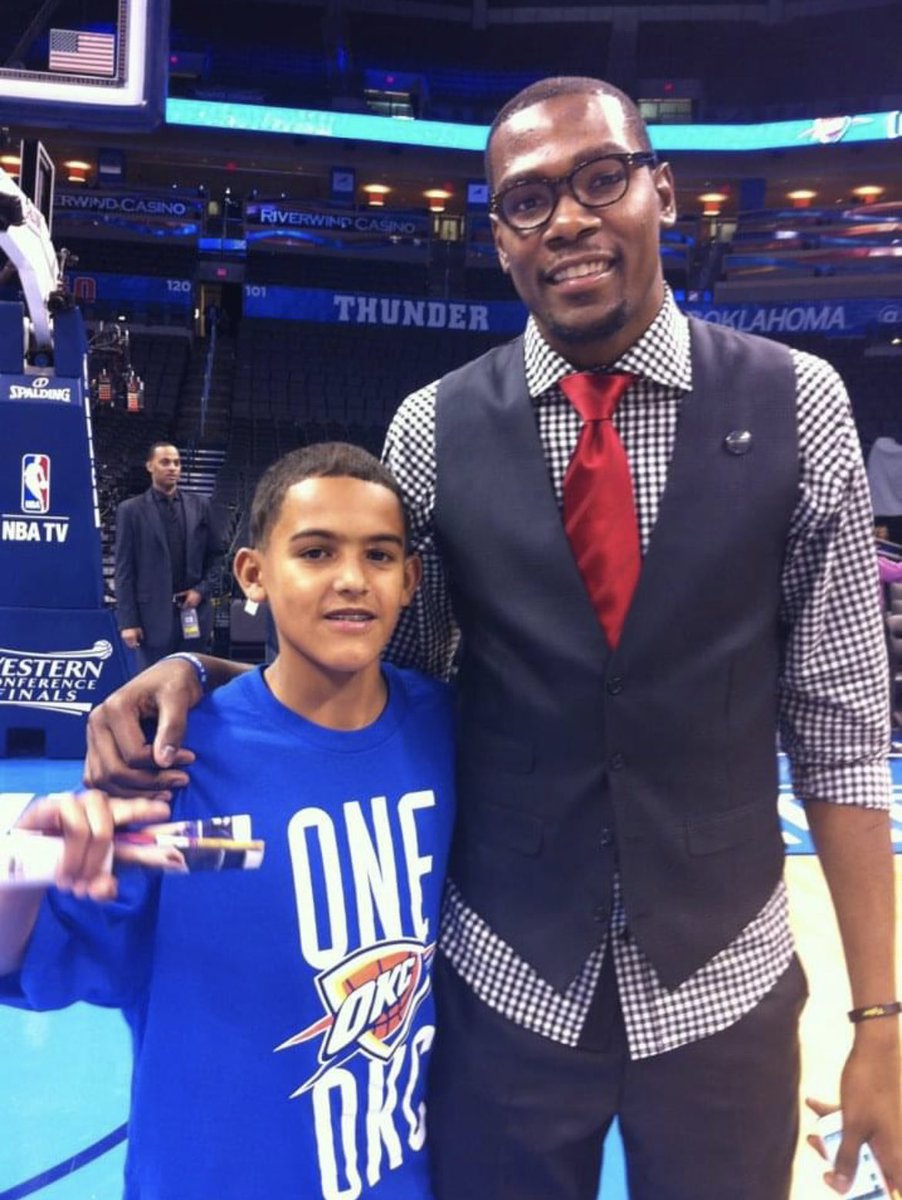 10 year anniversary of this picture. Game 1 <a href="/okcthunder/">OKC THUNDER</a> beat <a href="/MiamiHEAT/">Miami HEAT</a> with KD dropping 36/8…my friend <a href="/Davidvanterpool/">David Vanterpool</a> grabbed my son &amp; said “come meet <a href="/KDTrey5/">Kevin Durant</a>” …the rest was history. I asked <a href="/KendrickPerkins/">Kendrick Perkins</a> but he BIG TIMED us😂 Just playing💯