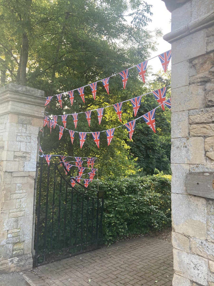 uffvillhall's tweet photo. How lovely to see the village bedecked in red, white and blue for the #PlatinumJubilee https://t.co/KMjYnjkKey
