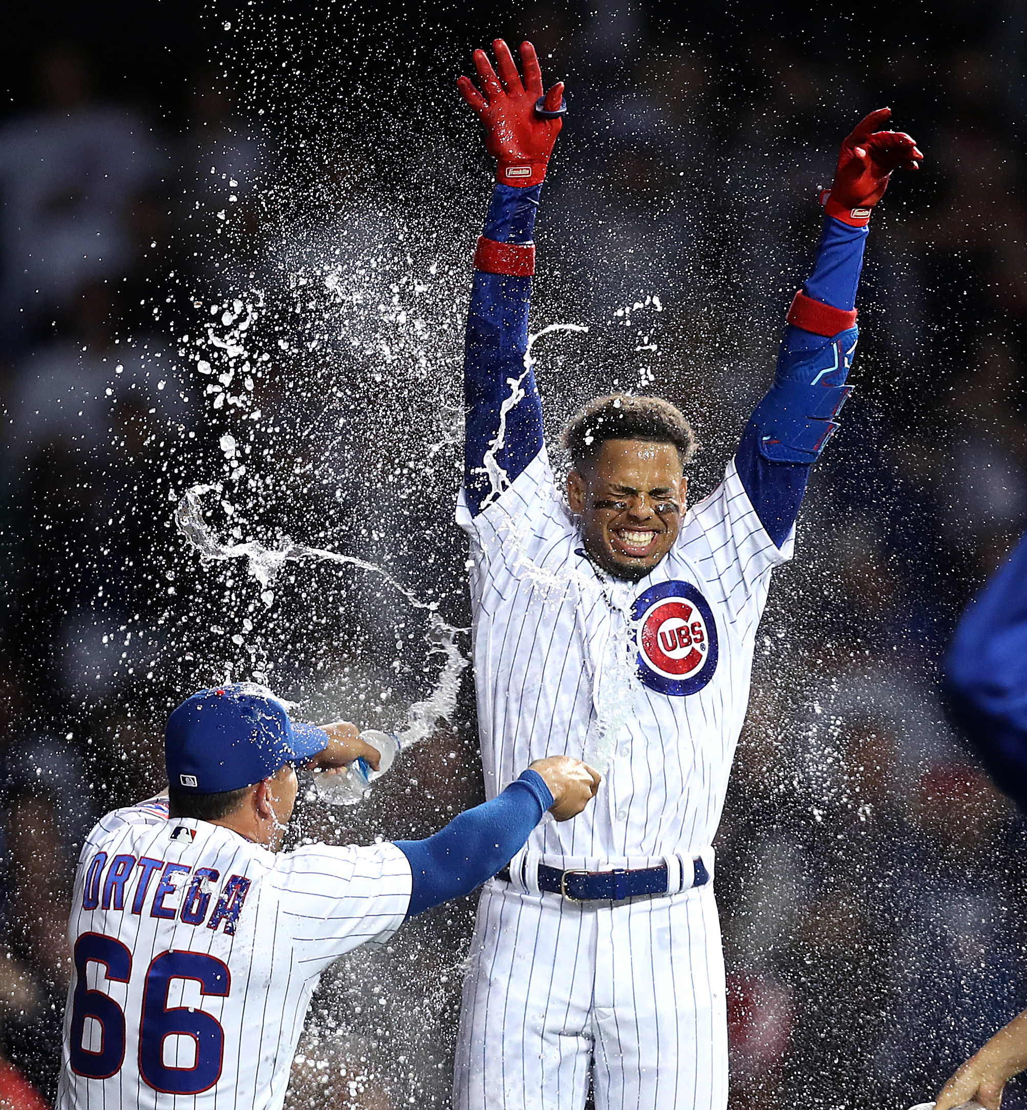 Chris Sweda on X: Chicago Cubs player Christopher Morel is showered in  celebration by teammate Rafael Ortega (66) after Morel drove in the  game-winning run with a sacrifice fly in the 10th