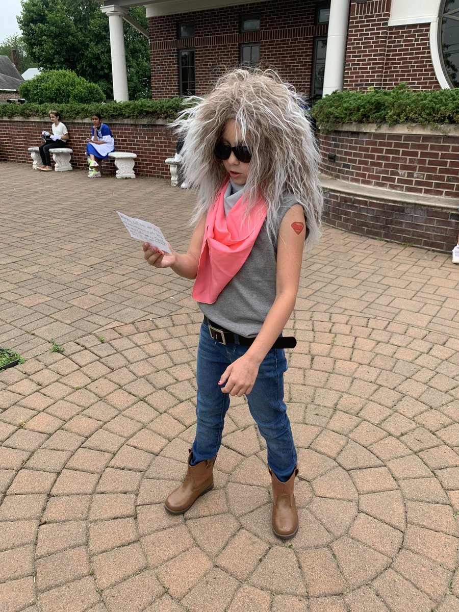 My niece rocking her best <a href="/jonbonjovi/">Jon Bon Jovi</a> for her living museum report.