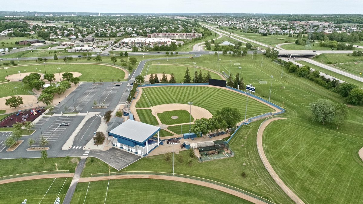 JSchlepStadium's tweet image. I do believe someone was putting in a bit of overtime today! WOW! 🤩 
Any guesses WHO is responsible for this work of art? We&apos;ll give you one guess! ;) #LawnmowerArtist @duane_slaughter @shakopeeindians @tschlepe @ShakopeeCoyotes @CityofShakopee @MinnBaseball @Fox9Sports