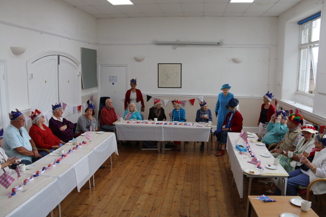 SBCaring's tweet photo. A Surprise VIP joined our Jubilee Party Wednesday, but even She couldn't let todays' news out of the bag early.  SBADC awarded QAVS 2022 #QAVS2022 https://t.co/Aao1IwQhKg