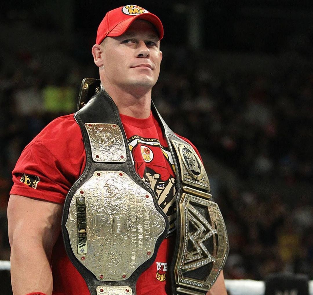 CenationEST's tweet photo. The way John Cena carried two titles around his neck was the coolest shit to 7 year old me https://t.co/VqYqQE4Bbs