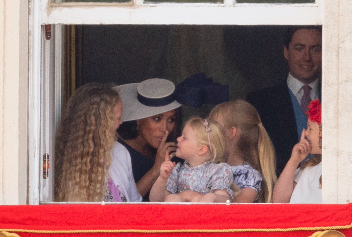 A playful Meghan, The Duchess of Sussex, is pictured with Savannah Phillips and Mia Tindall - during the Trooping the Colour ceremony at Horse Guards Parade 📸 ©Kelvin Bruce/Jim Bennett #PlatinumJubilee  #HM70 #TroopingTheColour mirror.co.uk/news/uk-news/q…