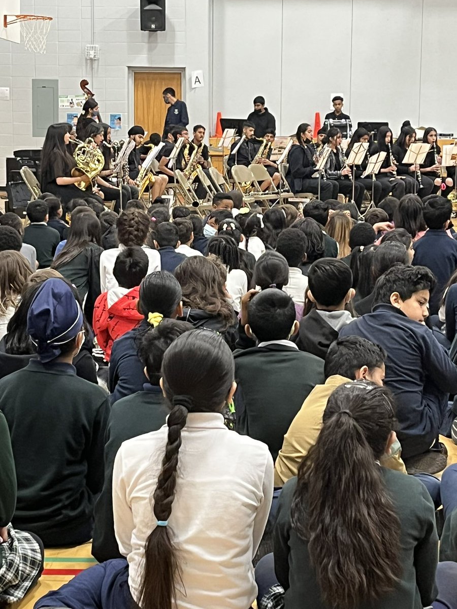 PrincipalAleta's tweet photo. So great to have the @AnnieGale band perform for our @CJMCBE students. Our students who are moving up are excited to pick out what instrument they may want to try next year! @Area4CBE #WeAreCBE https://t.co/RWHmlDSBJE