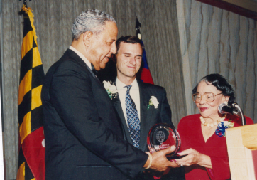 FuelFund's tweet photo. Today's #throwbackthursday is from one of the Fuel Fund's many Victorine Q. Adams Humanitarian Award Banquets! Here we see our founder and Baltimore legend, Victorine Q. Adams, awarding the prestigious honor circa 1990. #tbt #Baltimore https://t.co/AwmPylX5ne