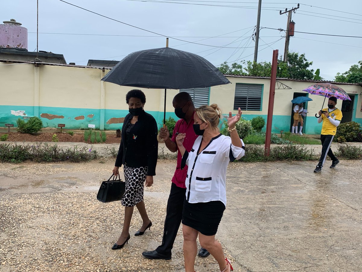 SAEmbCuba's tweet photo. Ambassador Phosa visited the Cuba-South Africa Friendship junior high school just outside Havana to engage with staff &amp; students, committing to return with more information on the history of South Africa &amp; @NelsonMandela on #MandelaDay. @DIRCO_ZA @AMO_icap https://t.co/AaEU3owqvp
