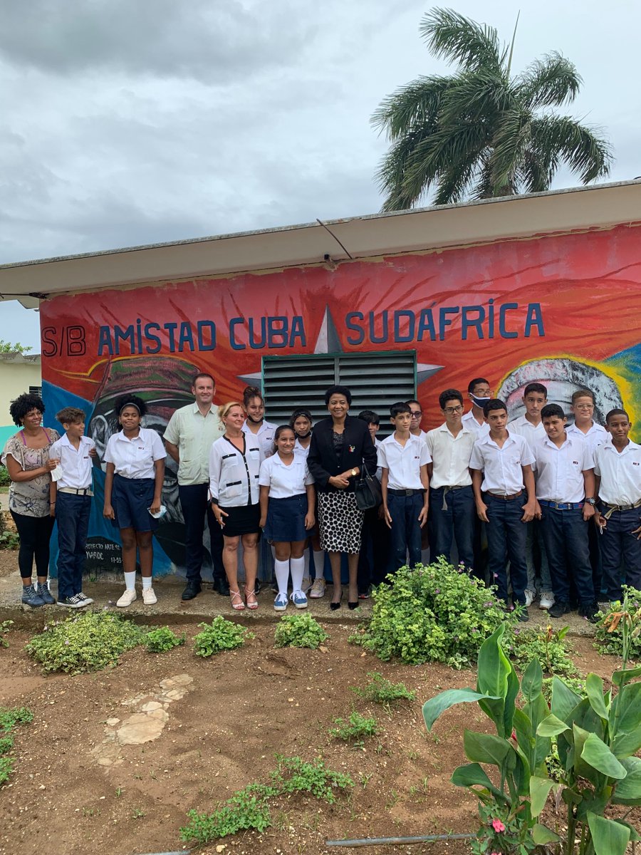 SAEmbCuba's tweet photo. Ambassador Phosa visited the Cuba-South Africa Friendship junior high school just outside Havana to engage with staff &amp; students, committing to return with more information on the history of South Africa &amp; @NelsonMandela on #MandelaDay. @DIRCO_ZA @AMO_icap https://t.co/AaEU3owqvp