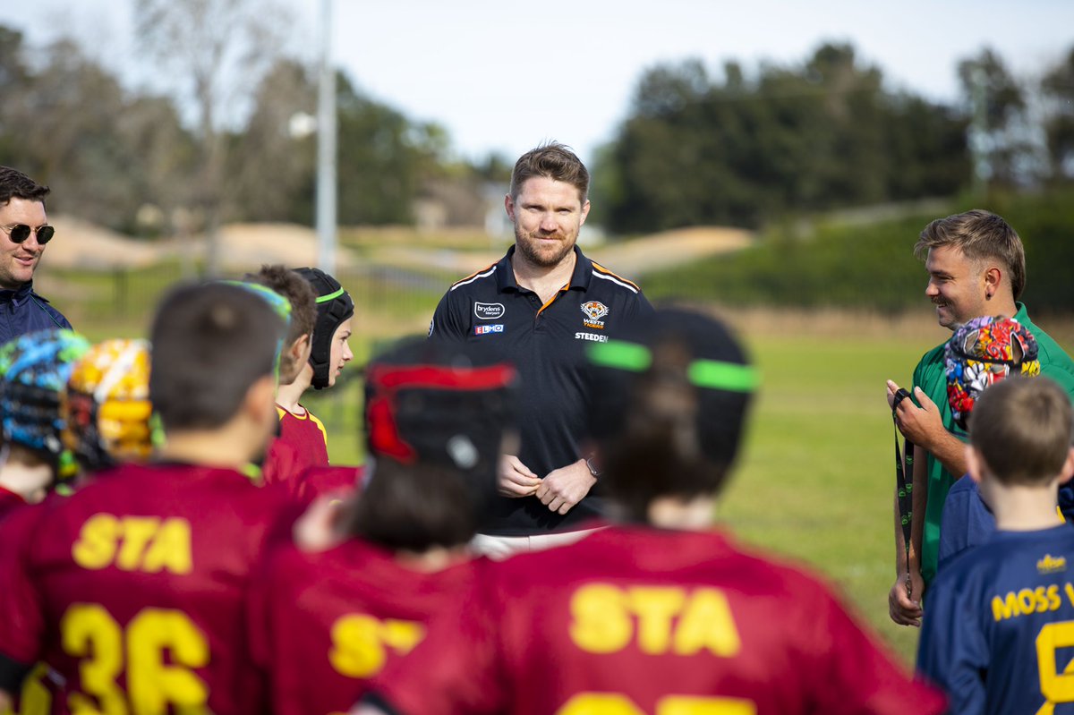 WSTFoundation's tweet photo. School footy is back! Introducing the inaugural Chris Lawrence All Schools Carnival. 

Combining our Legends of Wests Tigers with our community and grassroots is what it is all about. 🏉🌱 
#WestsTigers #Grassroots #Community https://t.co/jbpXAcNVKT
