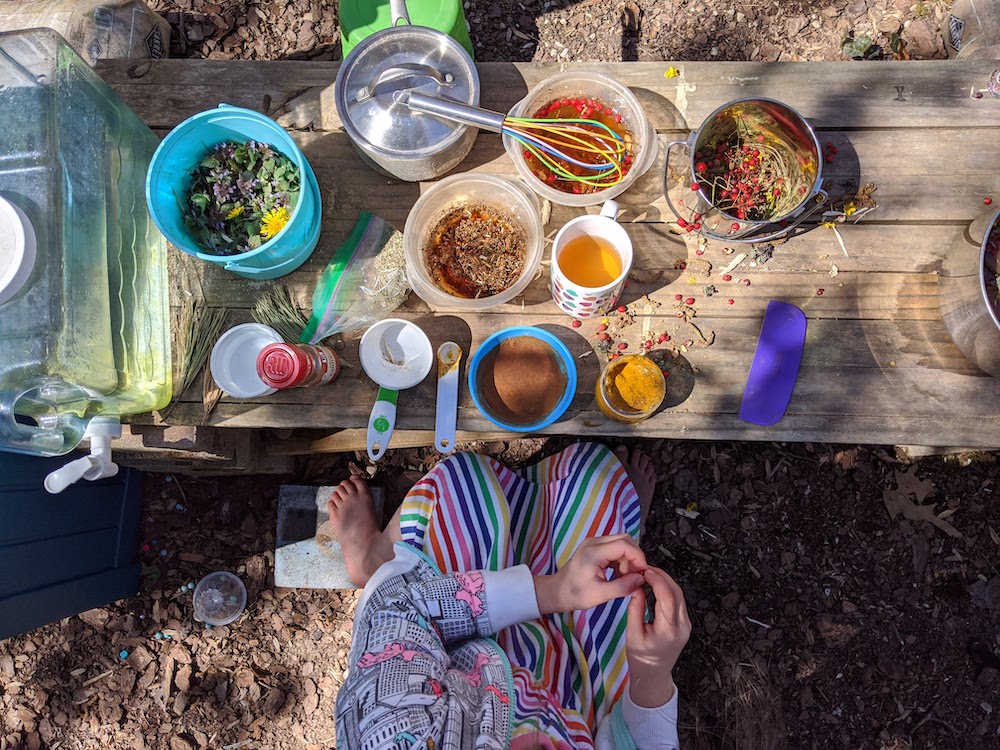 joinvroom's tweet photo. There's something magical about "cooking" outdoors with your LO. All you need is water, utensils/containers, nature treasures (🌺🐚🍀) &amp; your LO's imagination. What might they make? Take turns suggesting different things to cook. They're learning words, numbers &amp; more! https://t.co/2QmNcc1D3p
