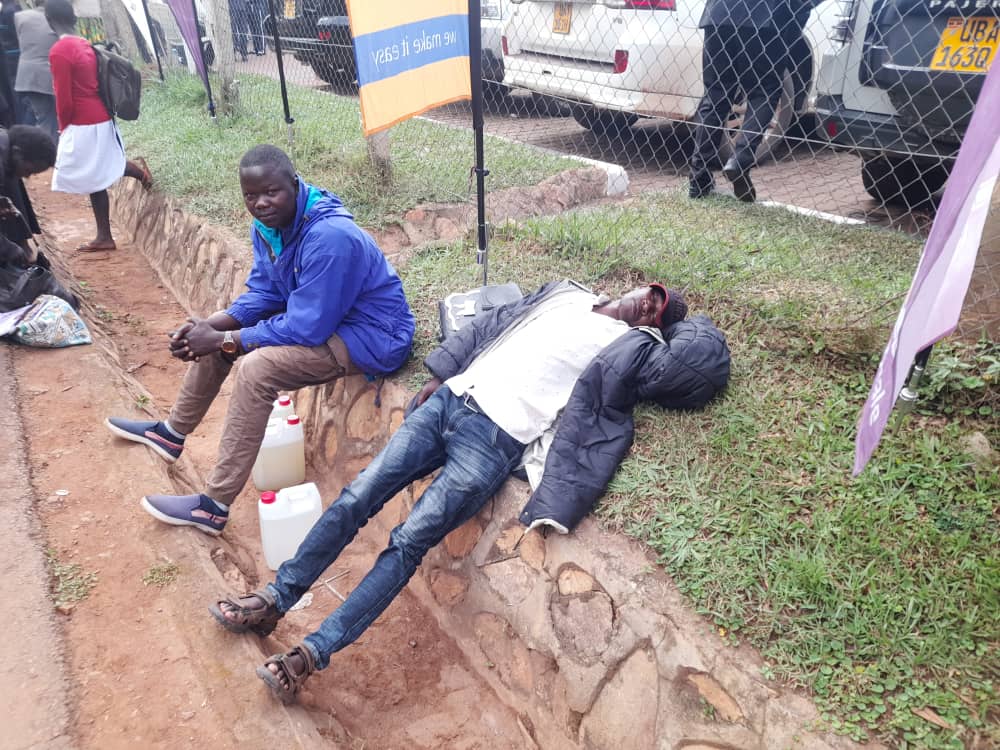 Daily Monitor on Twitter "A pilgrim takes a deep sleep on the road pavement. His friend says he