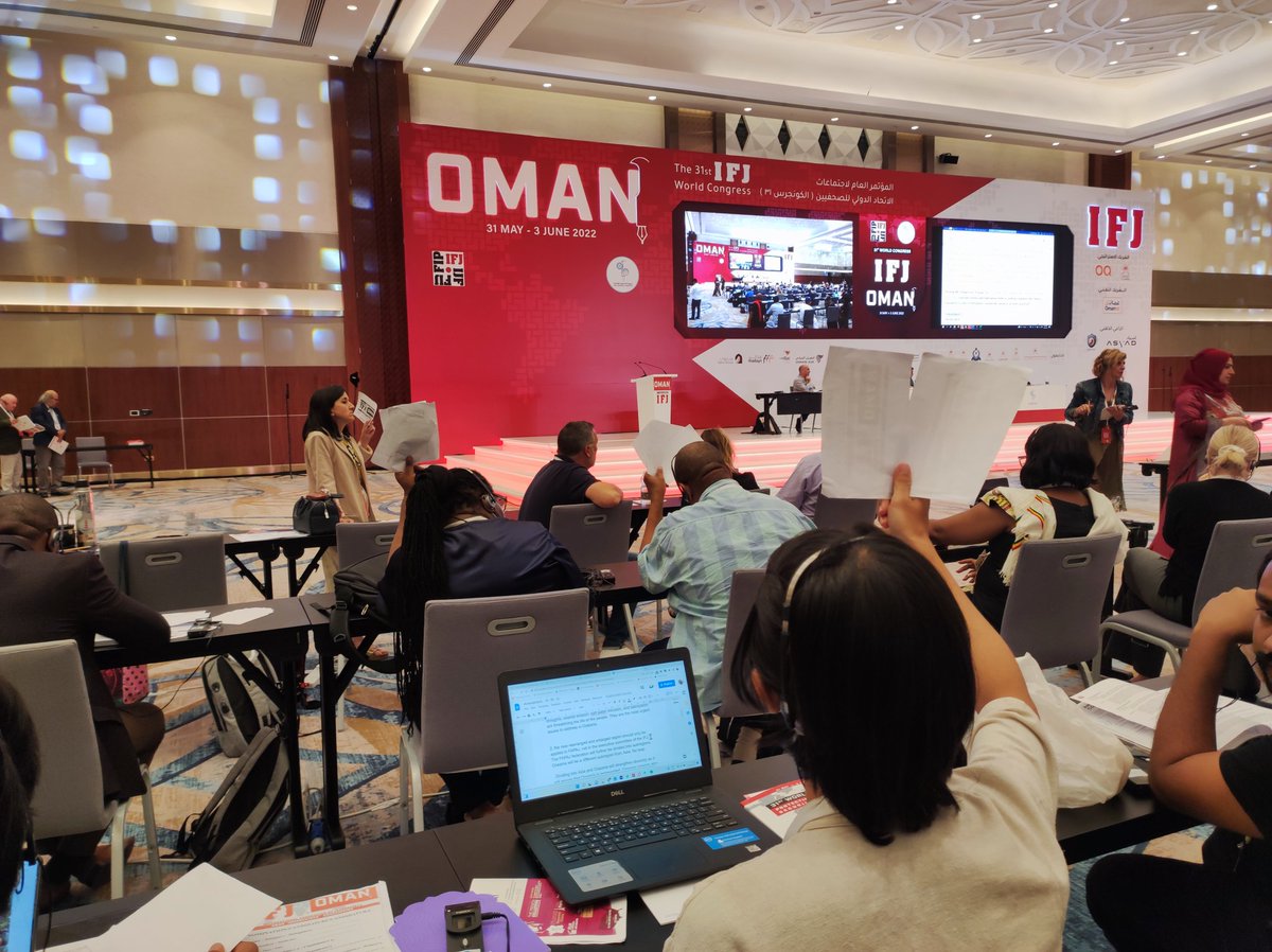IFJGlobal's tweet photo. Voting time at the #IFJCongress2022!
Delegates are debating and voting for motions on #PressFreedom, impunity, surveillance of journalists and #GenderEquality, among others 💪 https://t.co/dNLygLLjSz