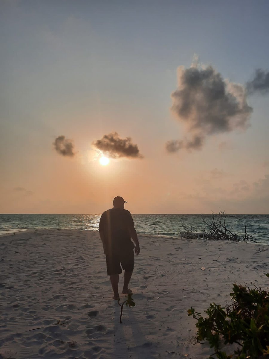 SohamShoney's tweet photo. @sahiscraftworld @VisitUdupi @KarnatakaWorld me walking towards the sunset in #Maldives https://t.co/Ziz2LD2VVH
