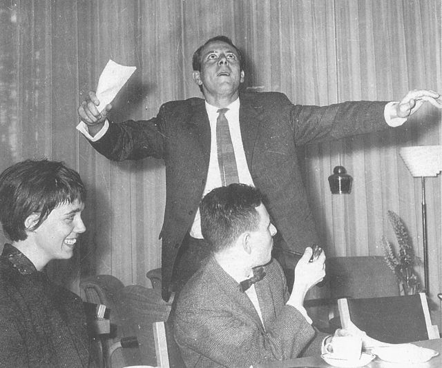 Karlheinz Stockhausen telling a joke.