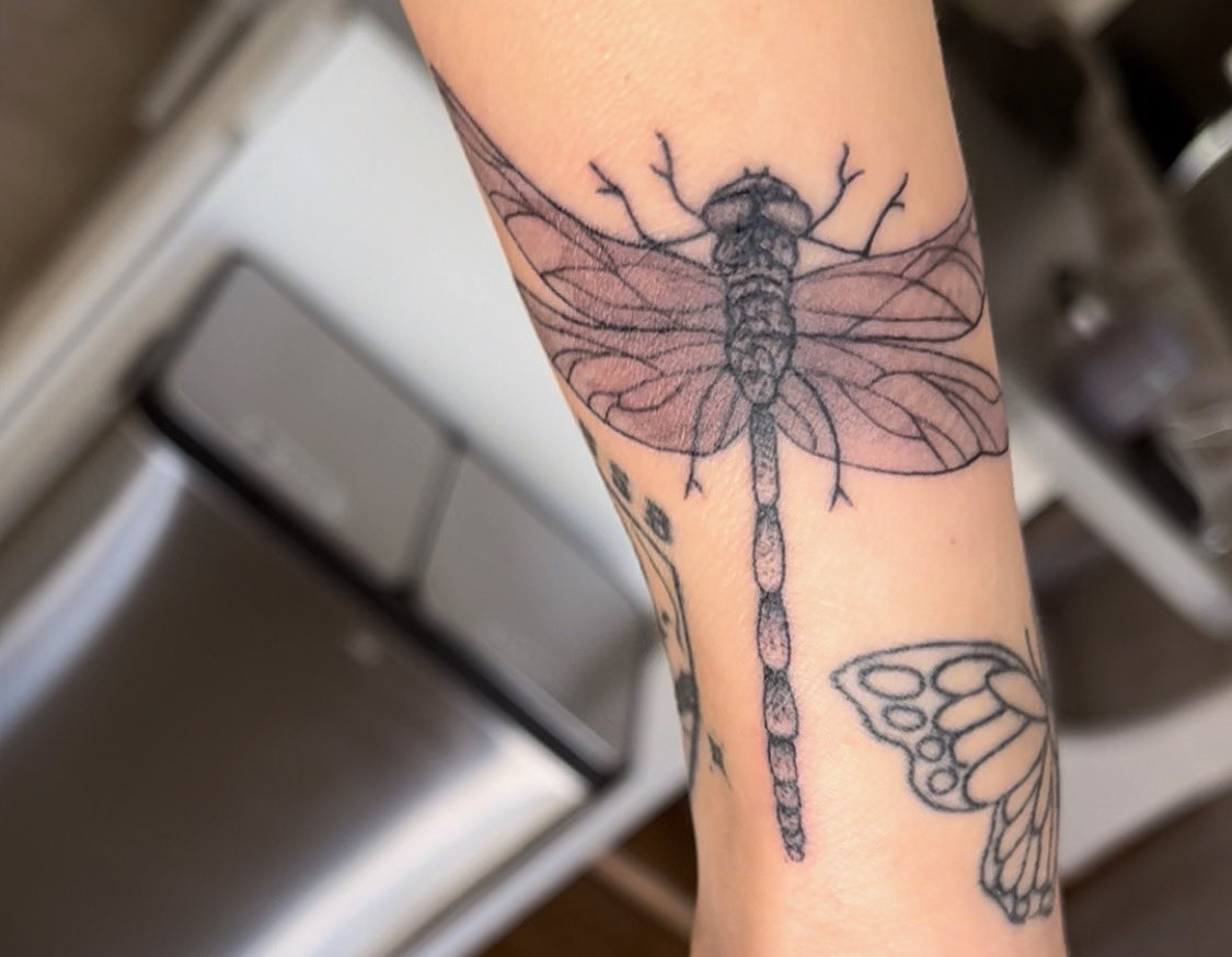 My favorite tattoo is probably the dragon fly on my wrist :) #PSPopQuiz
