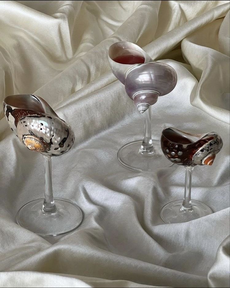 cosmicsolace's tweet photo. what’s wrong babe, you’ve barely sipped from your seashell glass https://t.co/FMOzgcclex