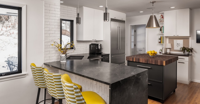 Kitchen of the Week: Two-Tone Style With a Butcher Block Island houzz.com/magazine/kitch…
