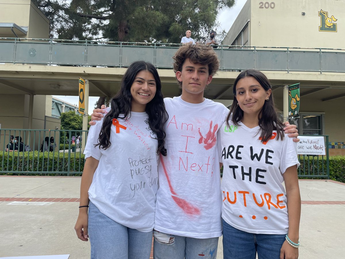 Tom Wood, center, was the one who started the ball rolling on todays walkouts. Ariana Lopez and Audree Rios were two of the other organizers at Poly