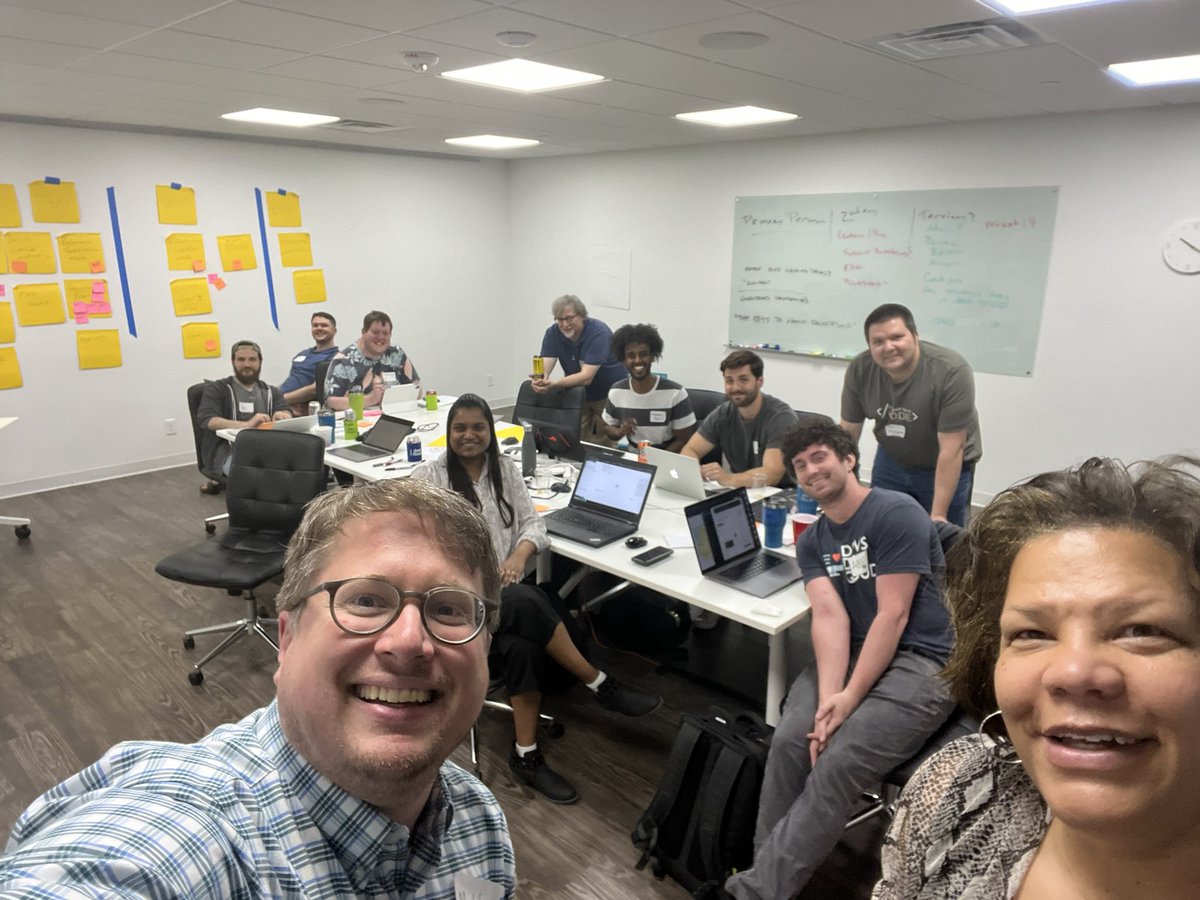 pchtf's tweet photo. Last night we got a team selfie. Our team member Matt is holding the camera and next to him is Margaret who is leading the project on behalf of The Directors Council. We are making good progress today! #dsmHack https://t.co/S9NL4Zjt0N