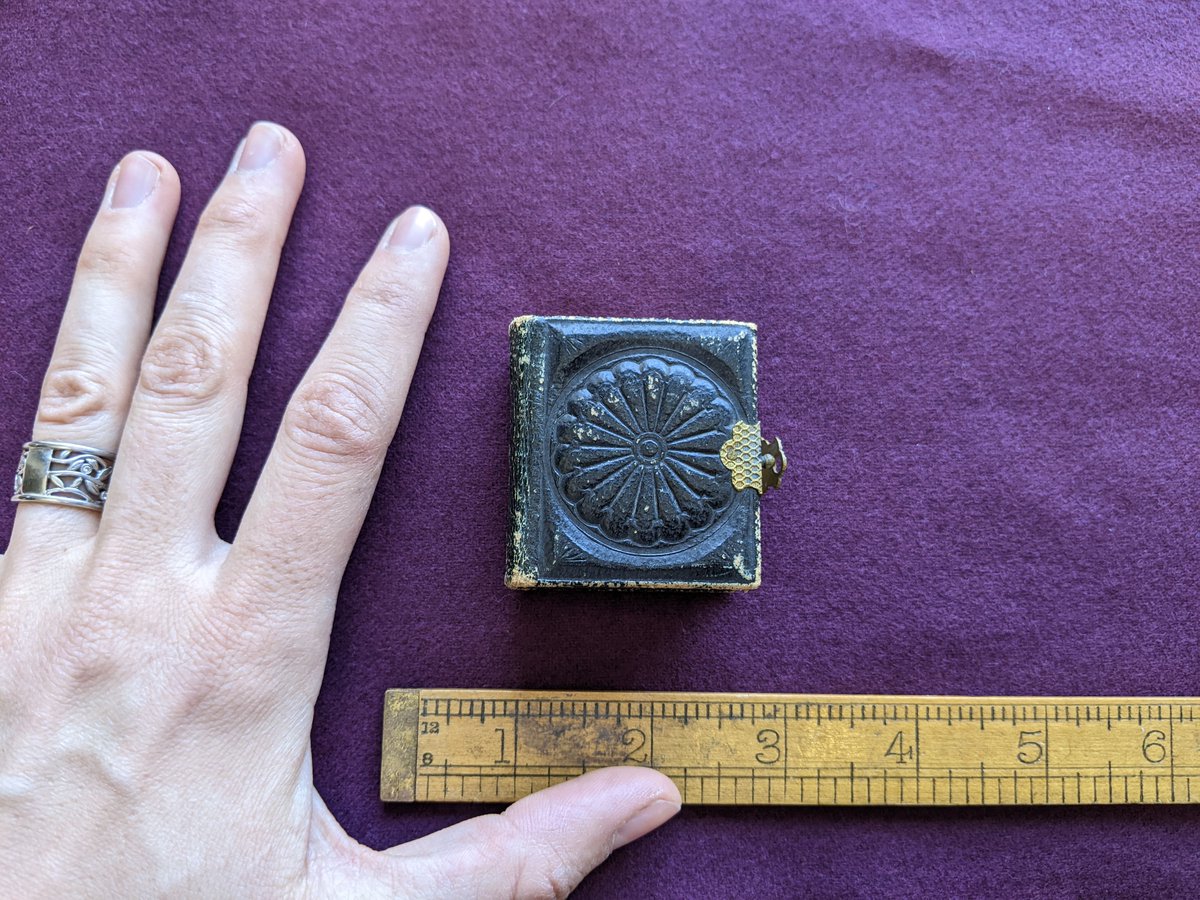 McGill_Rare's tweet photo. This Victorian tintype album is stunning! A part of the Royce Gale Miniature book Collection, there is no colophon or publishing information for this album of #miniature tintype portraits #tinybooktuesday #gilt✨ https://t.co/EbRVhReOTA
