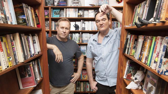 IndieWire's tweet photo. ‘Video Archives Podcast’ Trailer: Quentin Tarantino and Roger Avary Rewatch Cult VHS Tapes https://t.co/287Ha9YU5s https://t.co/vwJvHfde7d