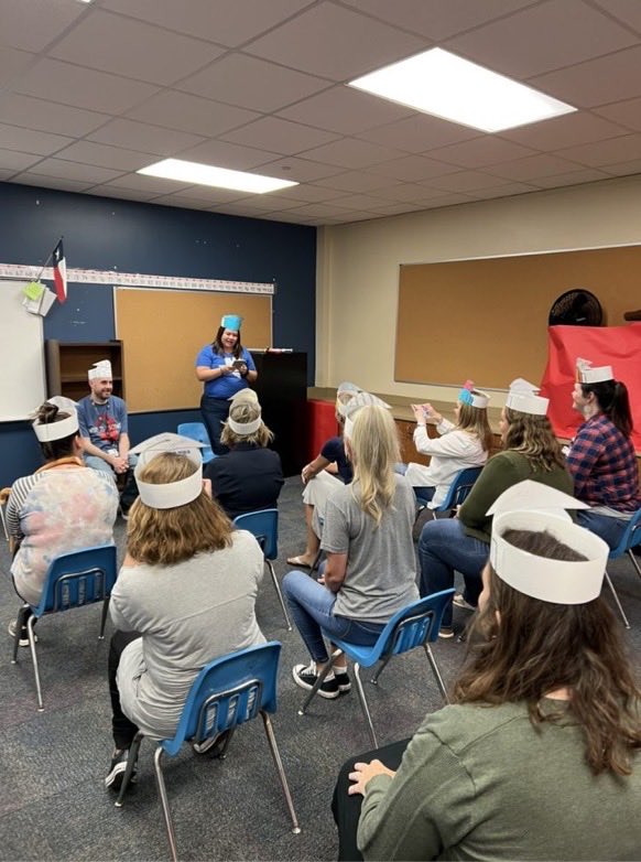 masmith1914's tweet photo. The ELA team wound up its year with curriculum writing and a special Reading Academy graduation ceremony for coaches and facilitators.  (Yes, we do the Academy, too).  Lead Facilitator Erika gave a moving commencement and graduates were knighted after receiving diplomas. https://t.co/68u4rDUMXI