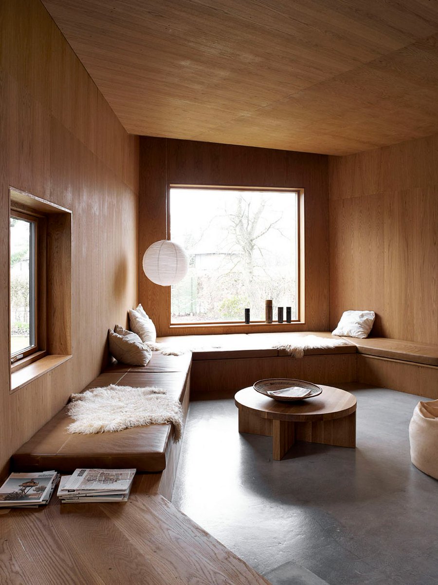 dezeen's tweet photo. Ten modernist living rooms that celebrate minimalist open-plan interiors: https://t.co/lYct8GQLOG https://t.co/pfAuFJ4db0