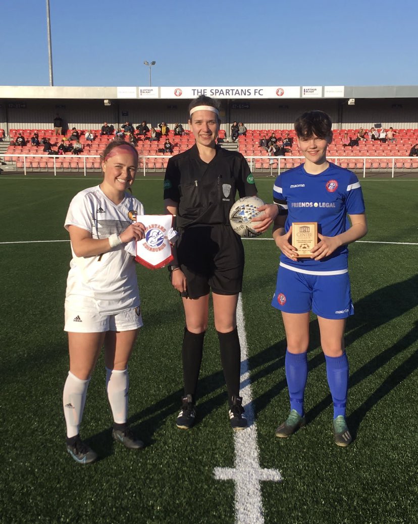 Captain Cara Francke and future TN Martin player exchange gifts prior to kick-off.