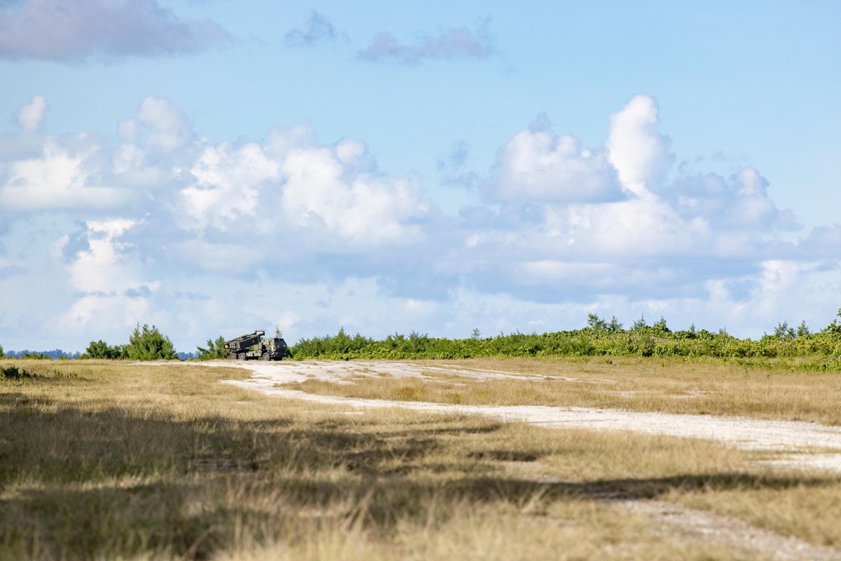 USMC's tweet photo. #Marines with @1st_Marine_Div conducted a High-Mobility Artillery Rocket System launch in support of exercise Valiant Shield 2022 in Palau, June 8. Participating units demonstrated their ability to achieve precise, lethal effects across the battlespace. #FreeAndOpenIndoPacific https://t.co/ABt1MWSBl3