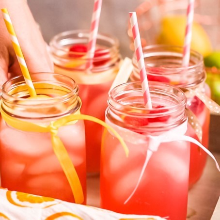 This sweet and tart boozy Raspberry Lemonade is the best way to beat the summer heat! The key here is fresh lemon juice and muddled raspberries. 🍋🍹 Head to our story for the full #recipe!