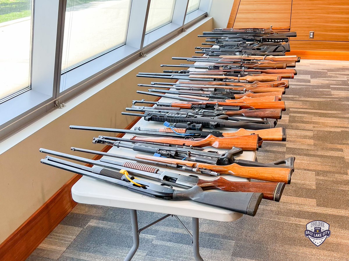 ChiefMikeBrown's tweet photo. Our gun turn-in event is going great! 

These are just *some* of the firearms we’ve recovered. Four of the firearms turned in today were previously reported as stolen! 

See my past tweet for more info on how to turn in your guns! #slc #slcpd #saltlakecity https://t.co/D264B7BMKg