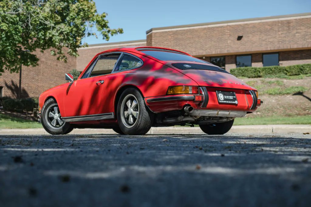 This 1973 #Porsche 911E Coupe is finished in it's original factory color of Bahia Red and has a Black interior with upgraded RS sport seats in Houndstooth. It has the original MFI fuel injection and only has 30,380 miles. #PorscheMarketplace ▶️ porschemarketplace.net/vehicles/1973-…