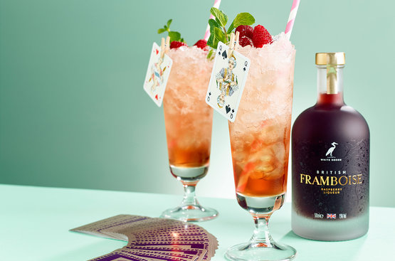 This is the Queen of Cocktails for Platinum Jubilee weekend;

35ml British Framboise
35ml Dark rum
Soda or Tonic water

Shake well and pour over plenty of crushed ice. Top with Soda Water or Tonic and garnish with fresh raspberries and mint. A light and fresh summer drink.