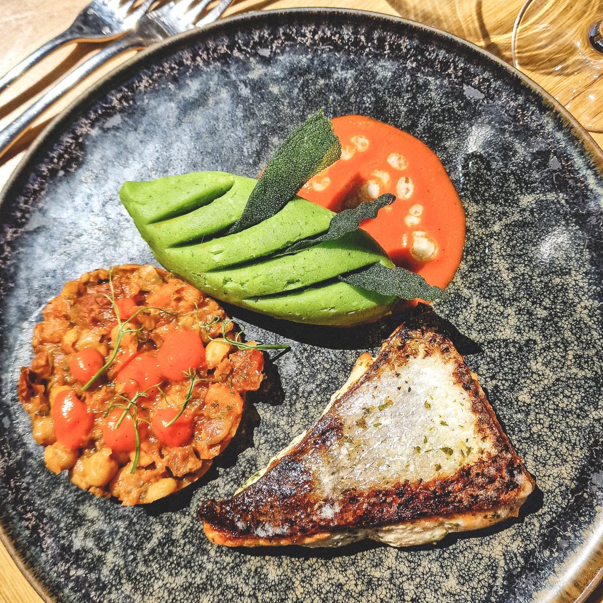 Weekend Chefs' Special! Organic Irish Salmon, White Wine Chorizo and Chickpea Ragú, Spinach Mashed Potatoes, Red Pepper Coulis, and zesty Citrus Oil .. tastes like a lovely Summer evening! <a href="/ChefSimic/">Mario Simic</a> #bankholidayweekend #malahide