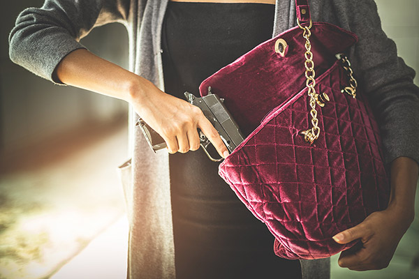 Mom pulling gun from purse