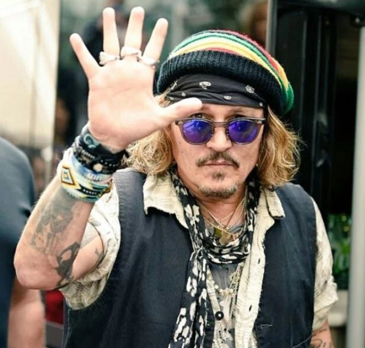 No_Reason_Jenz's tweet photo. Johnny Depp in Manchester 4th June 2022...

Look at his reaction towards the little dog...

My heart is melted!!! https://t.co/J2kKNrVlAb