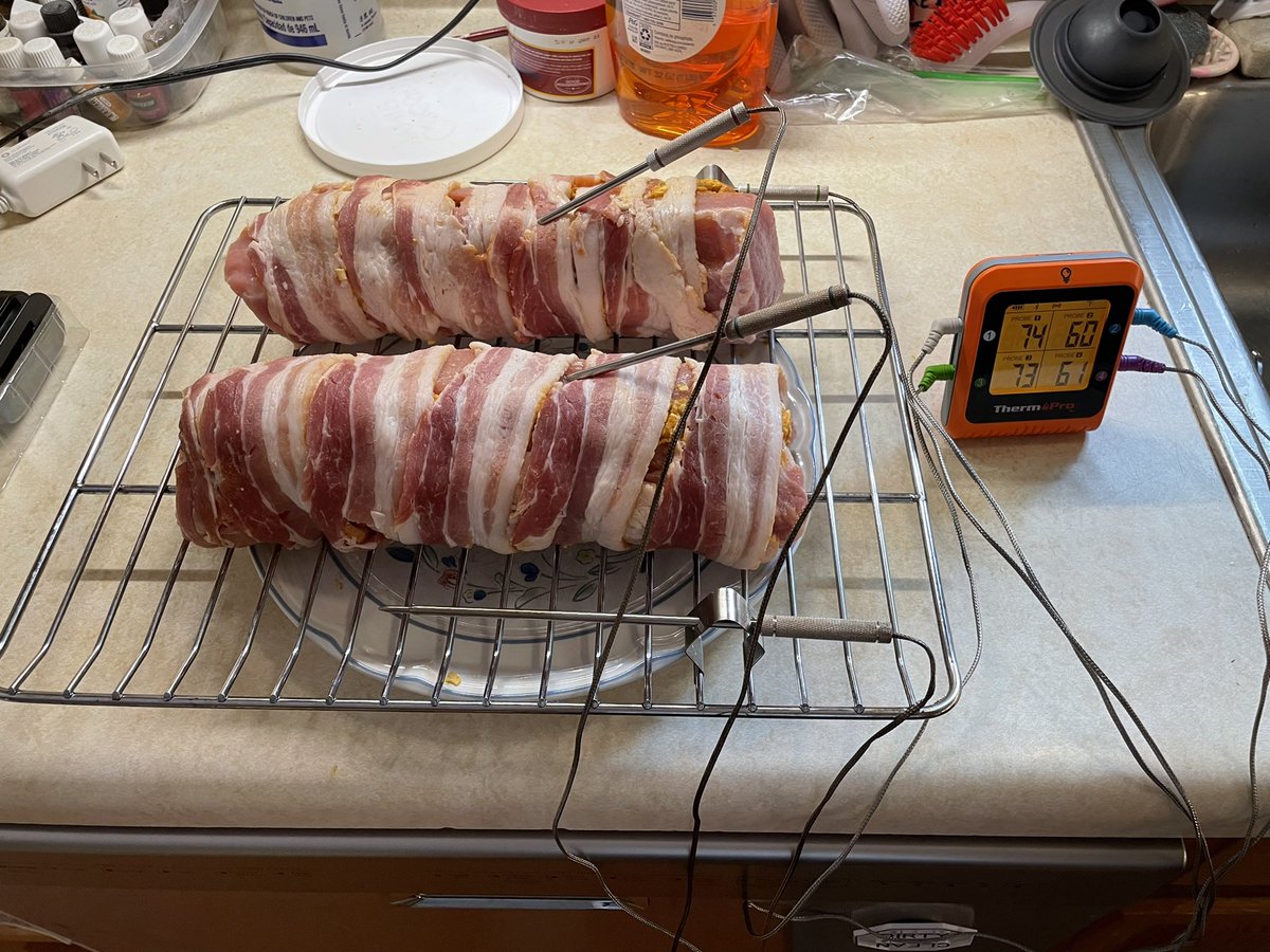 Because I’m an engineer and I need data while cooking!  For those of you keeping score, these are bacon wrapped pork tenderloins with jalapeño popper stuffing and they’re headed to the smoker.
