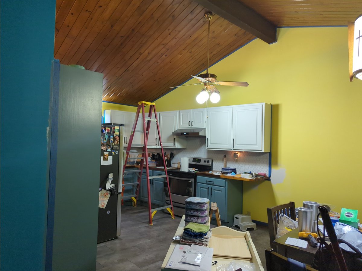 I know painters tape is the difference between a professional look and a wall looking like a 6yr old did it but taping this kitchen has me questioning my decision