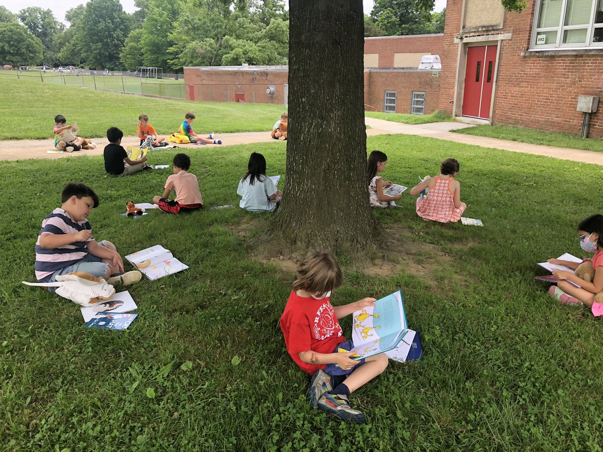 Q is for Quietly reading with our stuffie on our ABC countdown to summer! RFES 1st graders like the bonus of reading outside on a gorgeous Friday