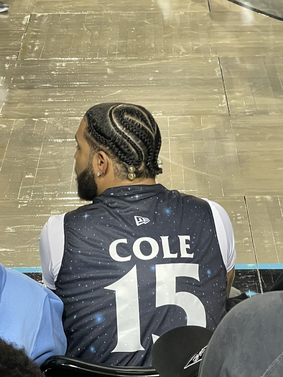 J. Cole sits courtside at UNC, hangs with Roy and players