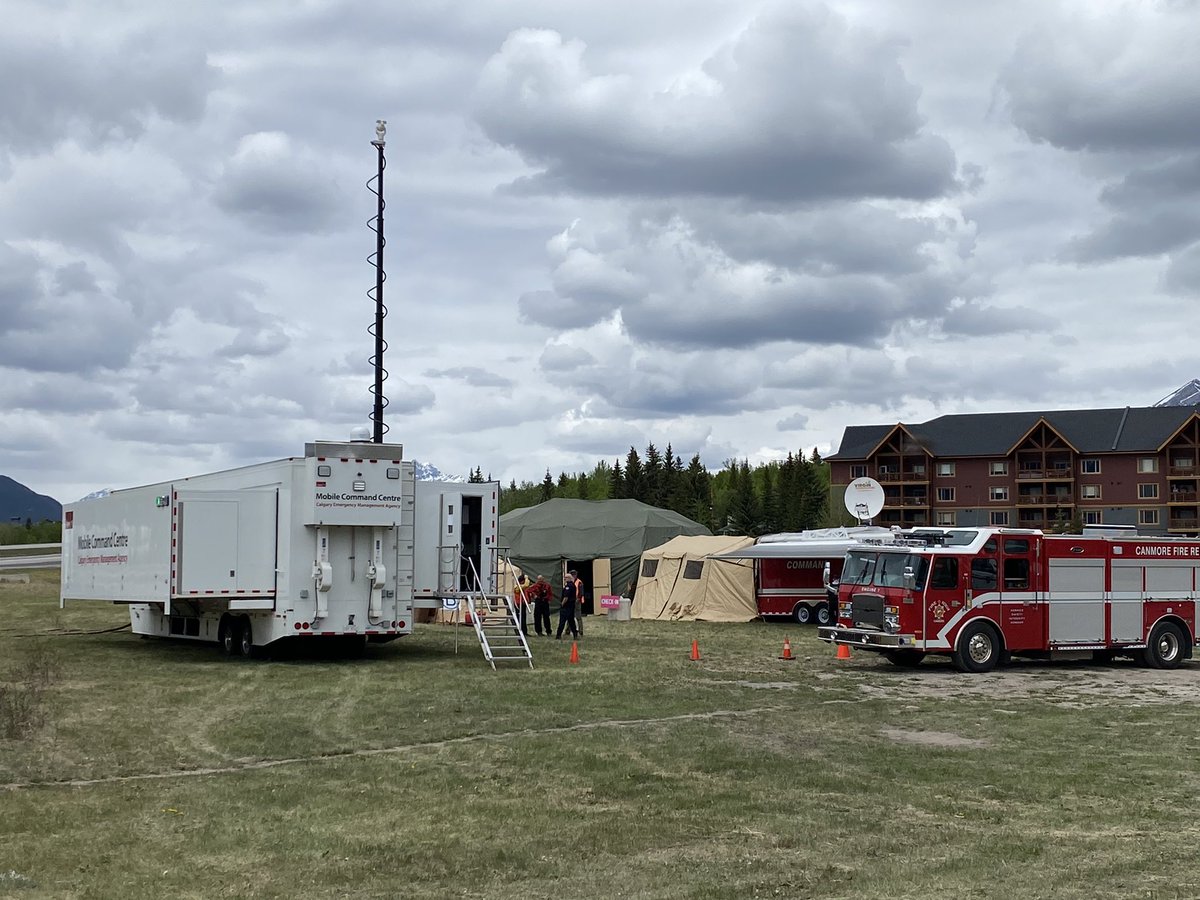CANTF2's tweet photo. Canada Task Force 2 along with response partners from around the region supported the Town of Canmore with a large-scale wildfire exercise including mock evacuations and the deployment of structural protection units today. Thank you to @CanmoreFireRes and @TownofCanmore https://t.co/db7E3gFFOd