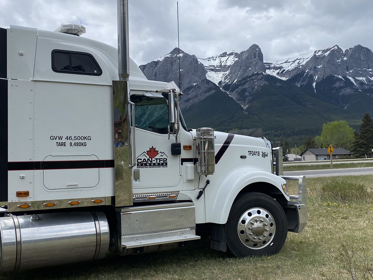 CANTF2's tweet photo. Canada Task Force 2 along with response partners from around the region supported the Town of Canmore with a large-scale wildfire exercise including mock evacuations and the deployment of structural protection units today. Thank you to @CanmoreFireRes and @TownofCanmore https://t.co/db7E3gFFOd