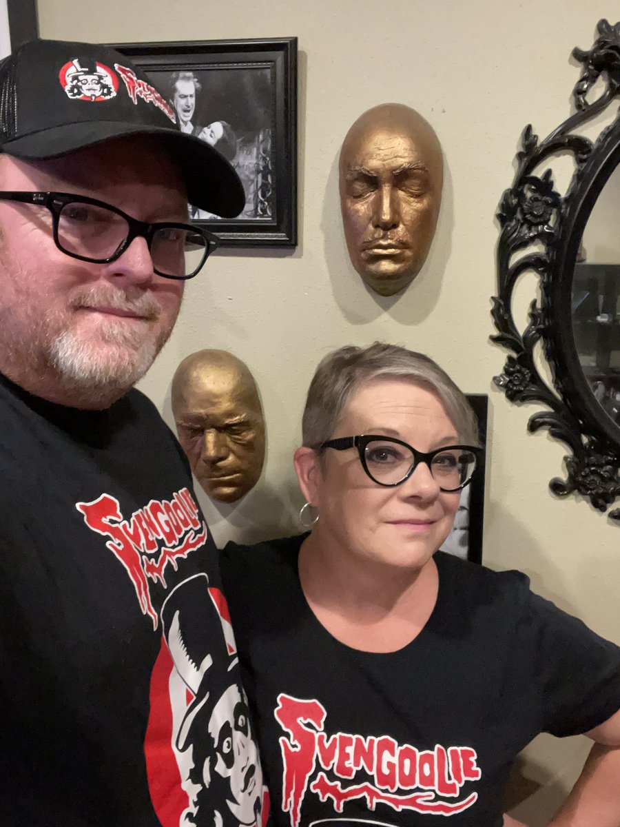 Watching #Svengoolie present “Monolith Monsters” on <a href="/MeTV/">MeTV</a> with <a href="/battyjenn/">Jenn Moore</a> while wearing our Sven gear. Yes that is Vincent and Boris on the wall