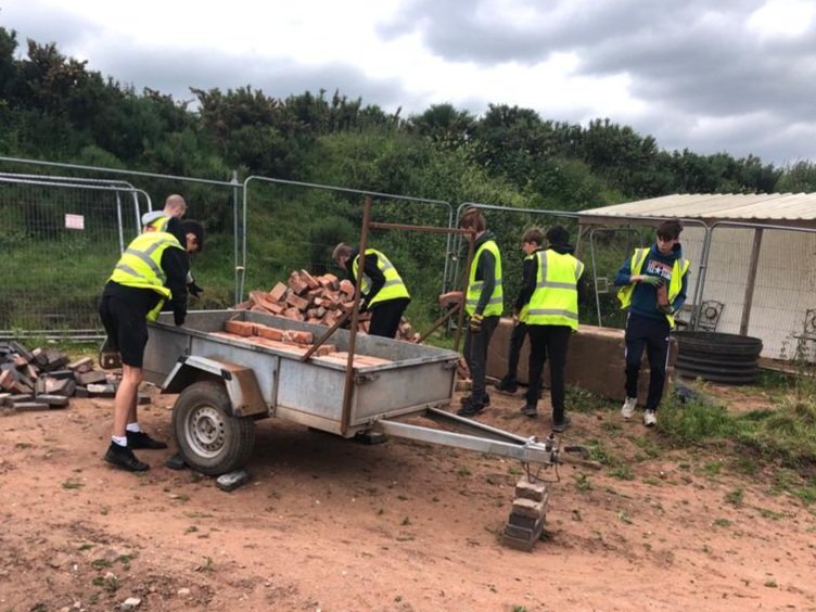 LHCRT1's tweet photo. While the #LichfieldBower was happening, our DofE and green team were hard at work; stacking bricks, checking saplings and cutting back grass so you can now see the piling name tags.
#VolunteersWeek https://t.co/2C2bXN05AW