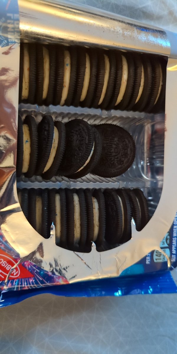 misskolarich's tweet photo. @Oreo Bought a pack from @Target so excited to try, opened them to find a handful missing. Looks like someone may have opened them in the store 😕 https://t.co/Urt4n22WLG
