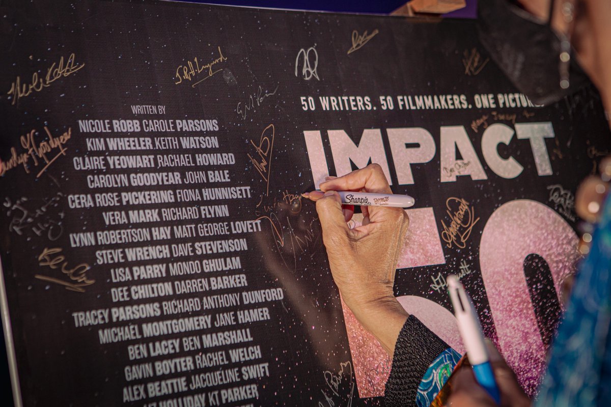 As we did with 50 Kisses, we brought a special mounted poster to be signed by EVERYONE involved. We managed to get a photo of most people signing, so have a look and feel free to share the ones of you. 
impact50film.com/signing-the-po… #Impact50