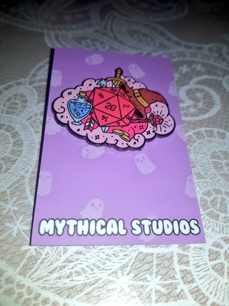 DnDDamsel's tweet photo. And it's always fun to add another pin to my RPG bag. This Glitter Dice and Gear @TheMythicalShop pin covers both the player and DM vibes #UKGE https://t.co/OKbsRnQBmt